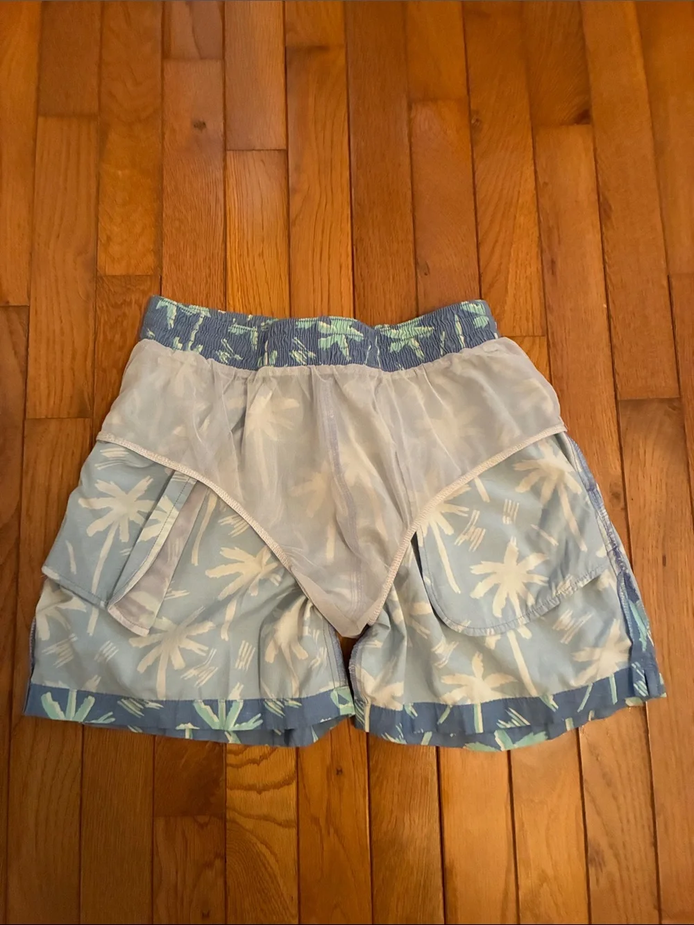 Chubbies Palm Tree Swim Trunks (Light Blue & Mint Green)